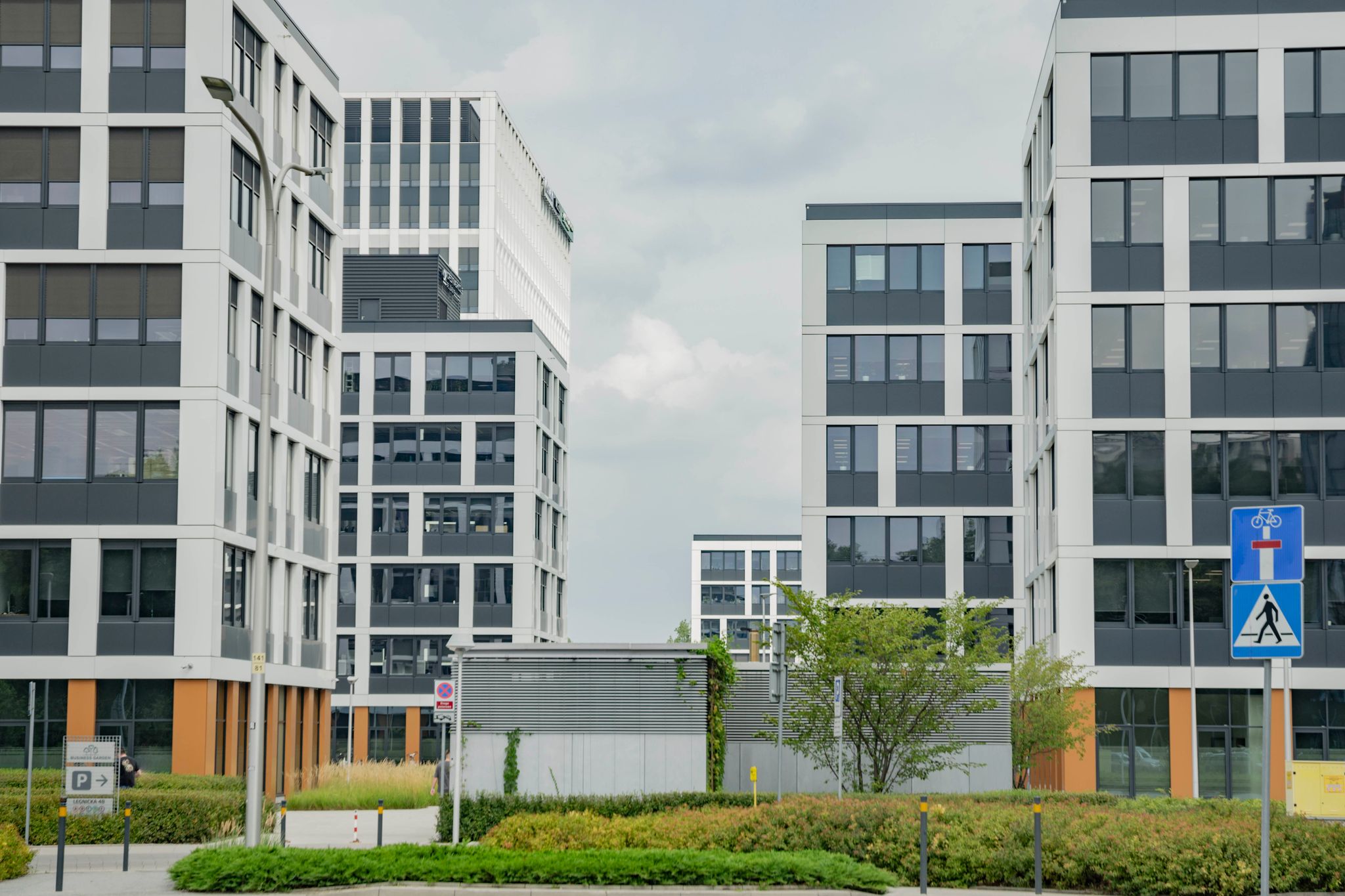 Contemporary office buildings in Wrocław, showcasing modern architecture and urban design.
